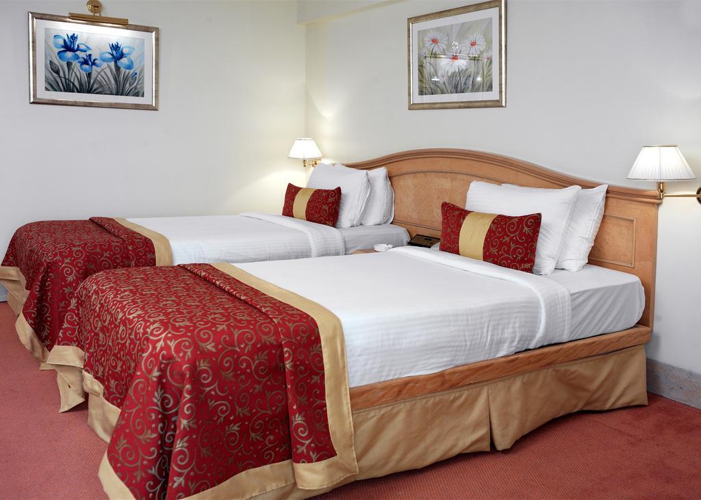 Hotel Ramada Plaza By Wyndham Palm Grove Bombay Exterior foto A guest room at the hotel